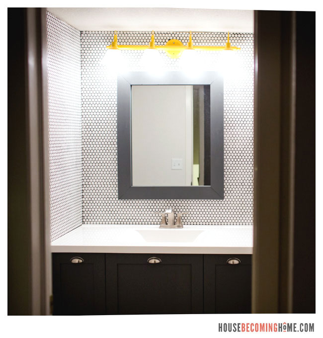 DIY bathrrom mirror on penny tile