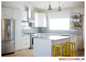 DIY Kitchen Renovation White Cabinets, Quartz Countertops, Yellow Stools