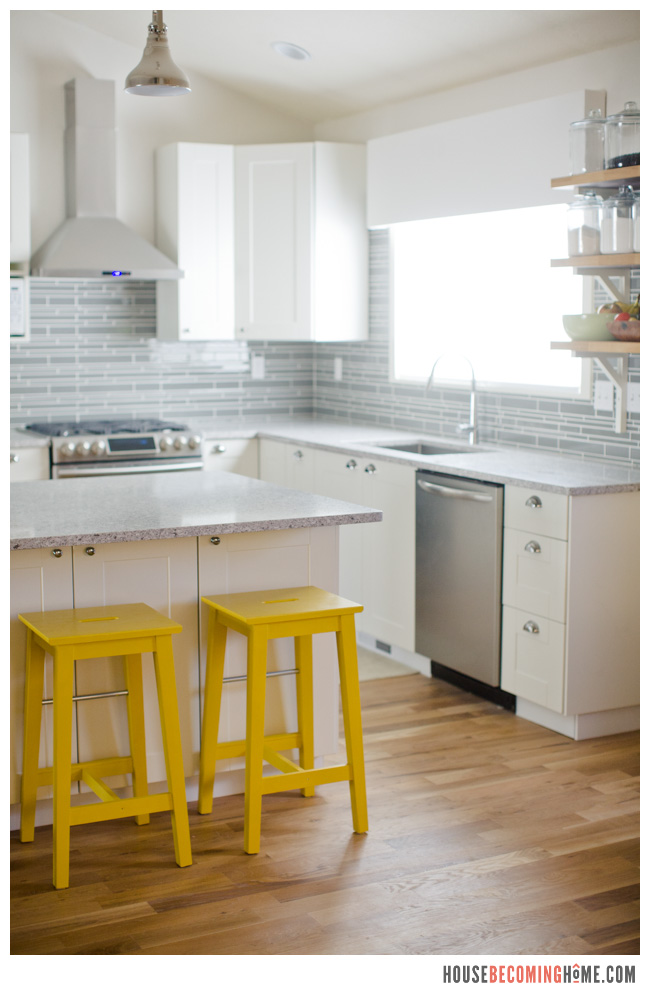 DIY Kitchen Renovation White Cabinets, Quartz Countertops, Yellow Stools