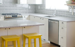 White Kitchen with atlantic salt quartz countertops by Caesarstone