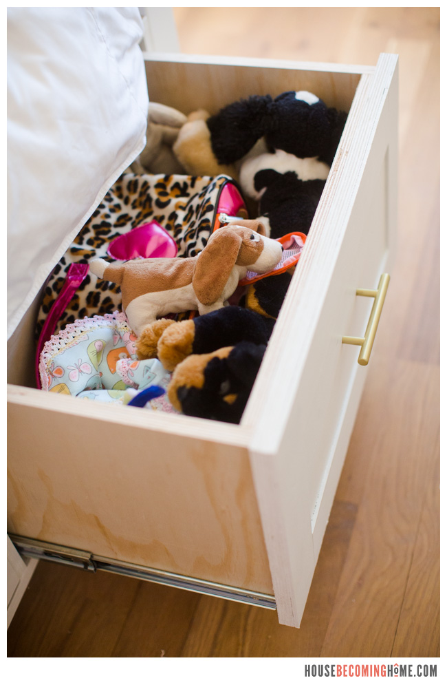 DIY Twin Bed with drawer full of stuffed animals