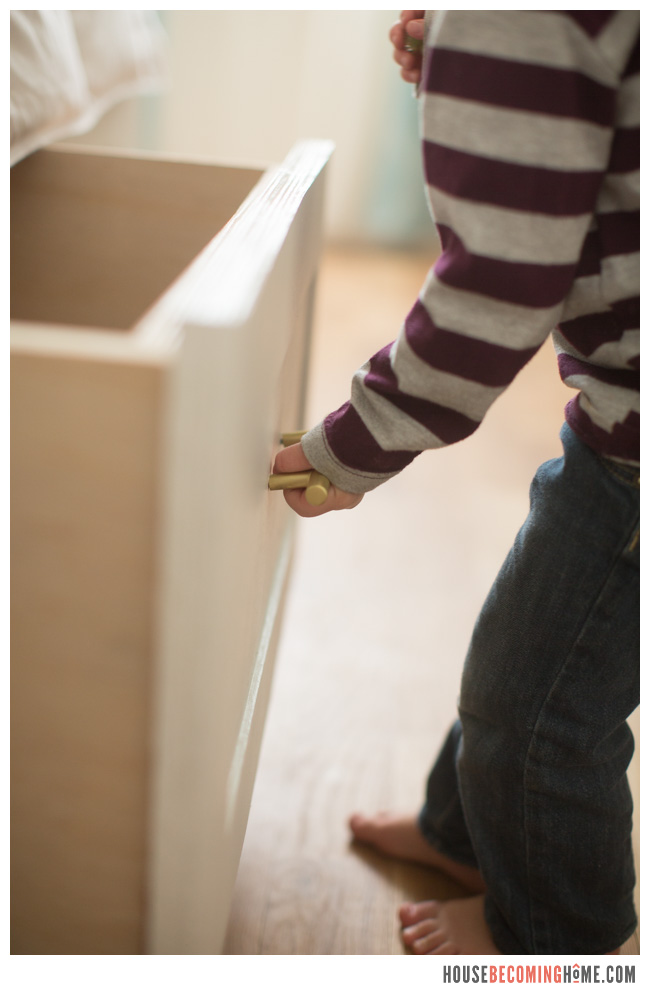 DIY Twin Bed child opening drawer