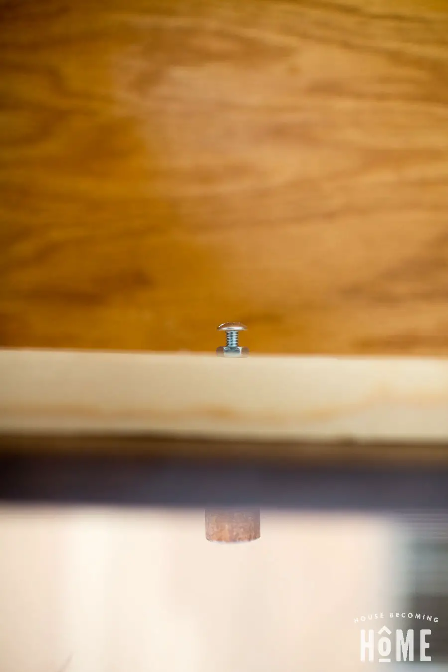 DIY drawer knob screwed into drawer top view