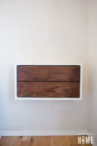 floating nightstand with DIY affordable drawer knobs made from wooden dowel