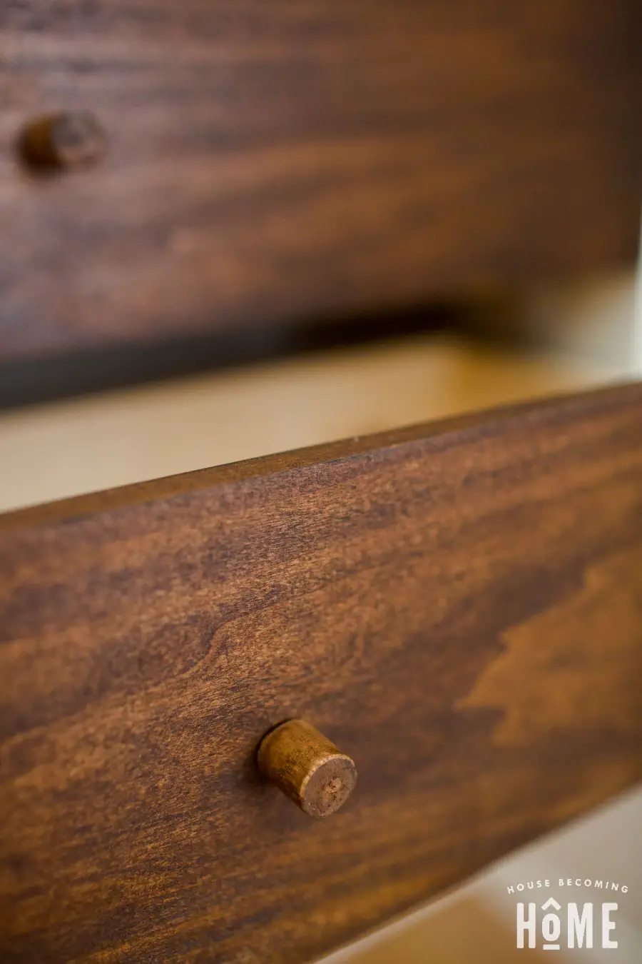 close up view of DIY affordable drawer knobs made from wood dowel