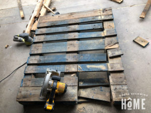 using circular saw to take apart wooden pallets