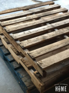 stack of wooden pallets for recycled wood art