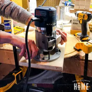using a router and jig to cut a circle in wood