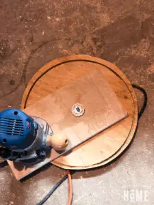 using a router and jig to cut a circle in wood