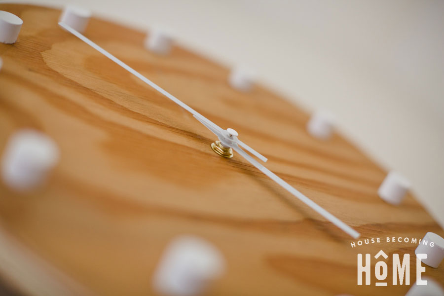 closeup of DIY clock from scrap wood