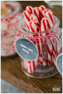 DIY Hot Cocoa Bar with Candy Cane Sticks. Free printable tags on baker's twine