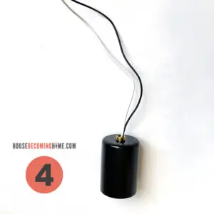 Black socket over socket to make a black and brass Bathroom Light Fixture