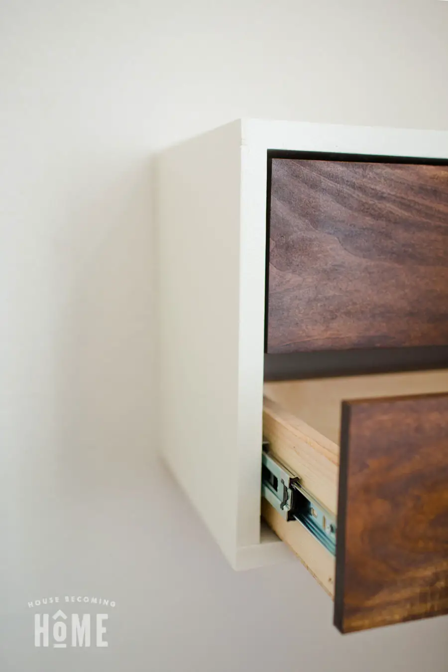 How to Build a Simple DIY Floating Nightstand with Drawers. Includes free printable pdf plans.