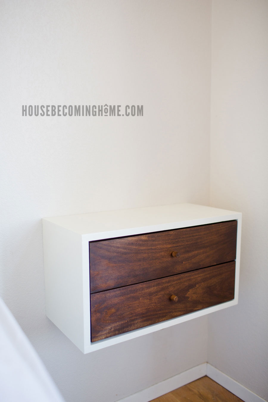 How to Build a Simple Floating Nightstand with Drawers. Includes free printable pdf plans.