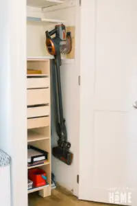 Shark Vacuum Hanging in Small Closet