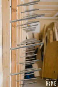 Close Up of Conduit in DIY Lumber Rack Side View