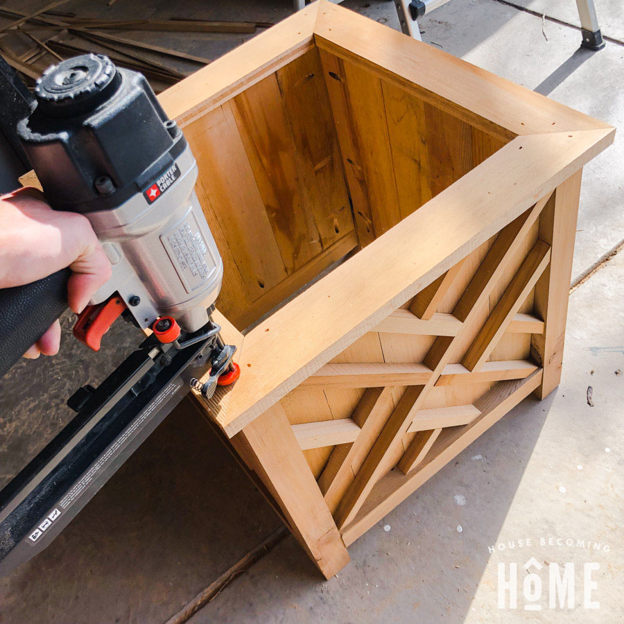 Nailing Down Mitered Top for DIY Cedar Planter with Decorative Panels