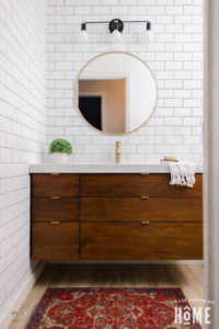 Small Bathroom Renovation After Shot on House Becoming Home : floating wood vanity, white subway tile, boho rug, black and brass light fixture