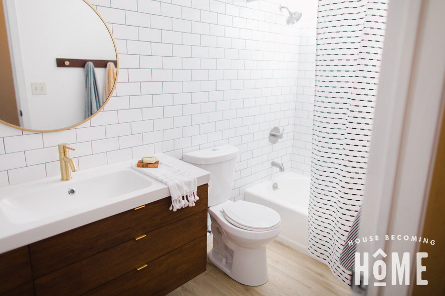 Small Bathroom Renovation After Shot on House Becoming Home : floating wood vanity, white subway tile, painted bathtub