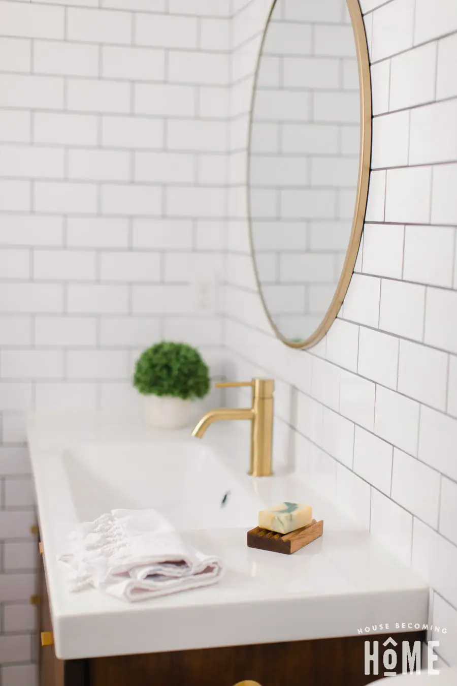 Small Bathroom Renovation After Shot on House Becoming Home : floating wood vanity, white subway tile, brass faucet and white countertop