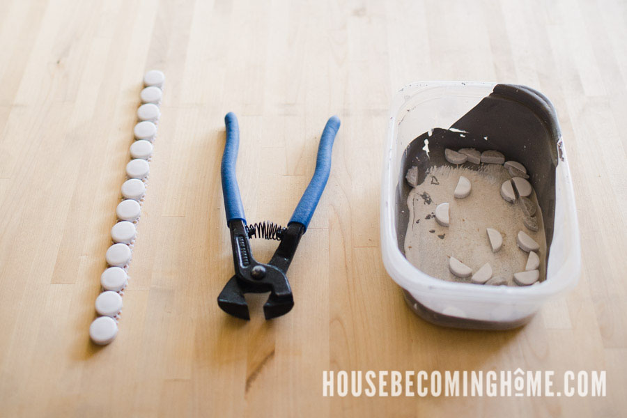 Use an old container to catch the pieces of penny tile as you cut them