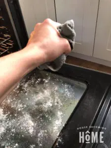 Dampening Bar Keepers Friend to Clean Oven